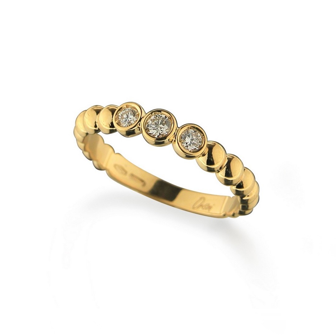 Anello Trilogy con sfere e diamanti